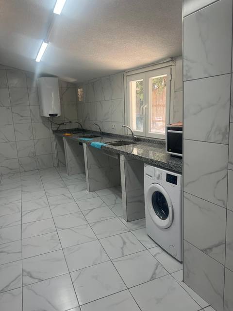Modern çamaşırhane ve mutfak alanı